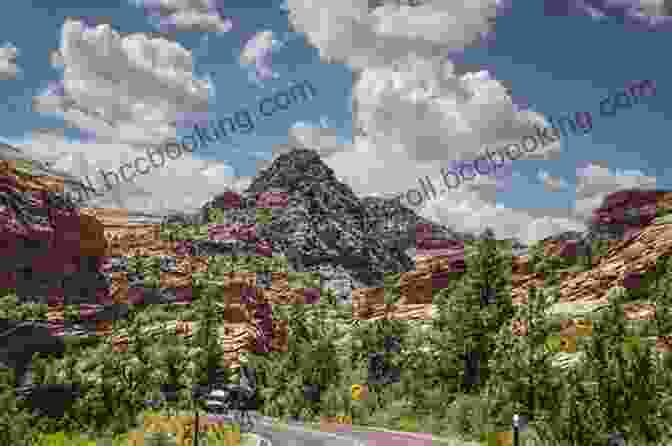 A Panoramic View Of Zion National Park, Featuring Towering Sandstone Cliffs And Lush Greenery A Complete Guide To The Grand Circle National Parks: Covering Zion Bryce Capitol Reef Arches Canyonlands Mesa Verde And Grand Canyon National Parks