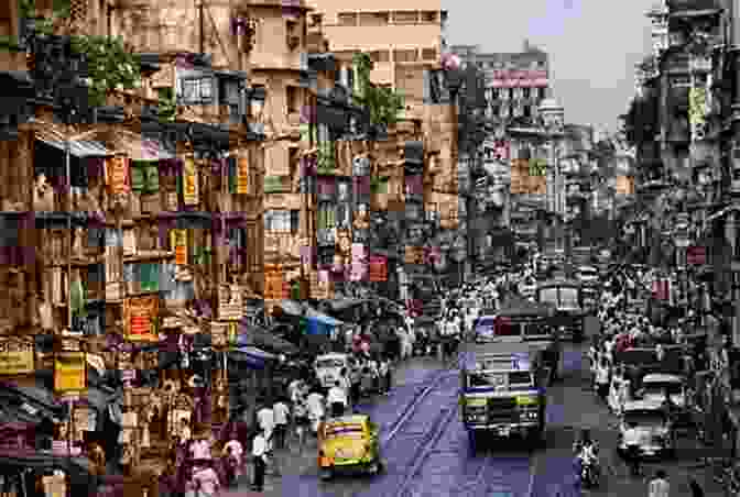 A Vibrant And Chaotic Street Scene In Calcutta, India, Filled With People, Cars, And Colorful Buildings. The Epic City: The World On The Streets Of Calcutta