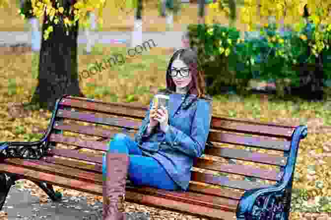 A Woman Sitting On A Bench, Looking Relaxed And Happy Drop The Ball: Achieving More By ng Less