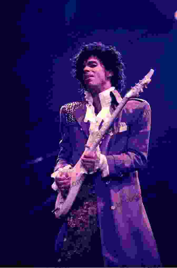 Prince Performing On Stage With His Iconic Guitar The Life Of Cesare Borgia: Biography Of The Prince